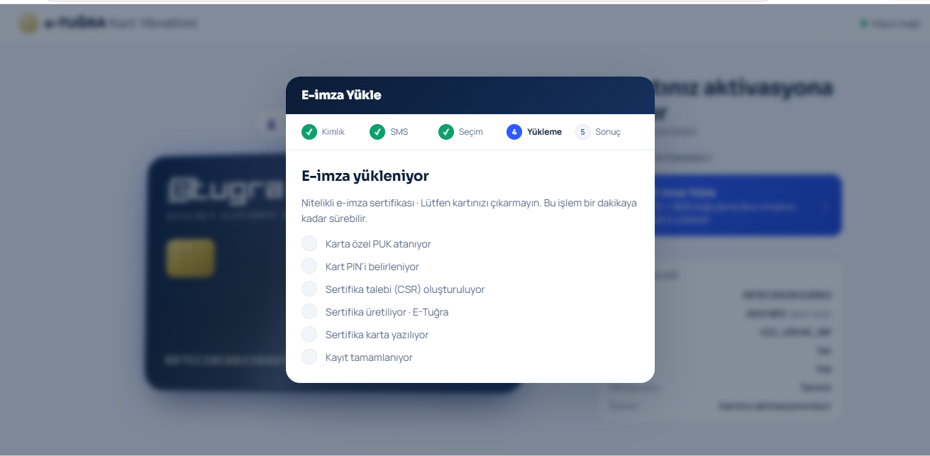 E-imza yükleniyor paneli: PUK atama tamamlandı, kart PIN'i belirleniyor, sonraki adımlar sırada